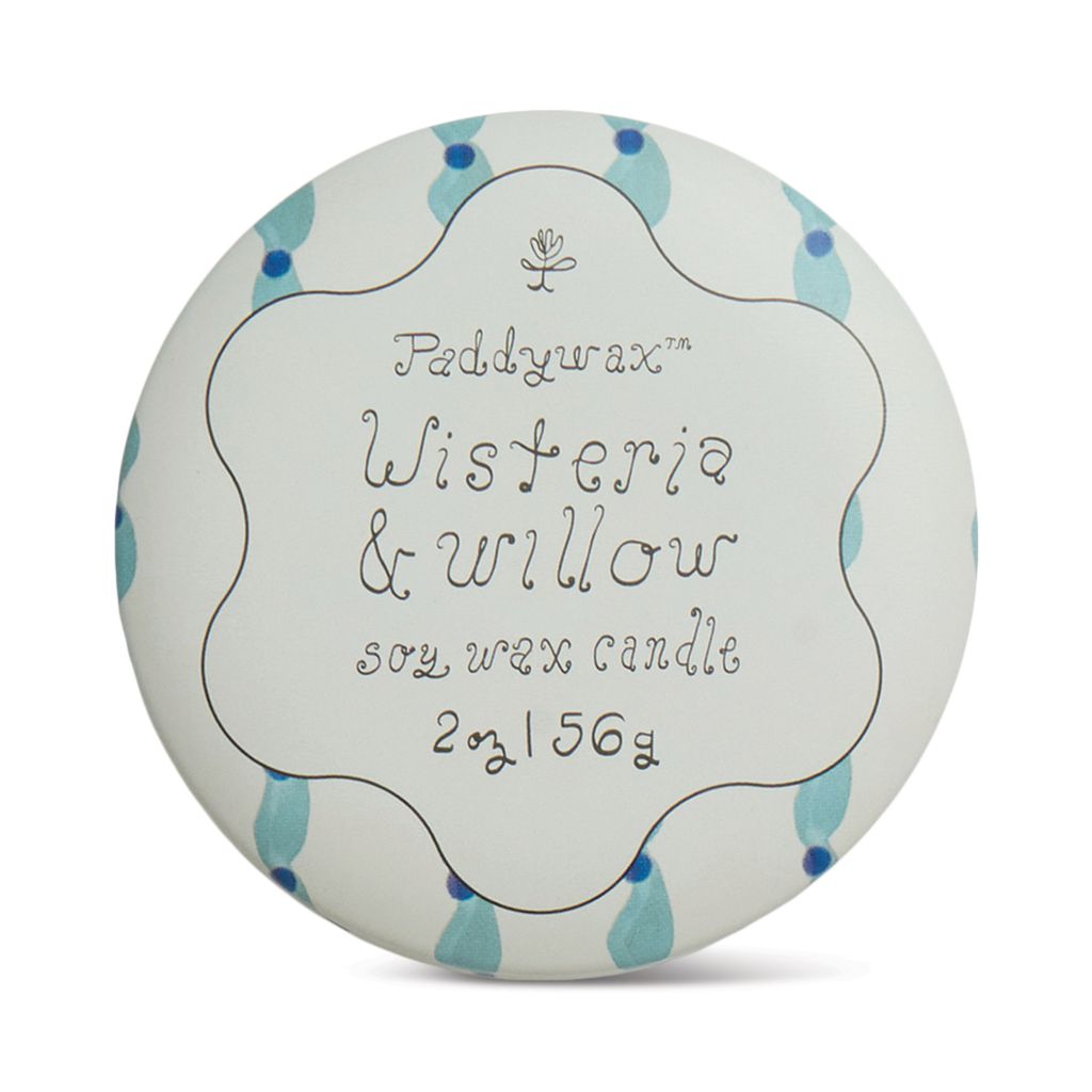 Paddywax Wisteria &amp; Willow candle packaging with blue accents on a white background