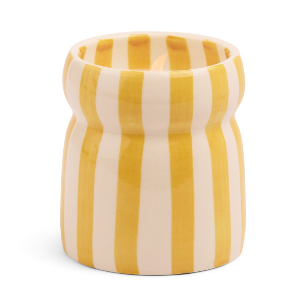 Cylindrical ceramic candle with yellow and white vertical stripes on a white background