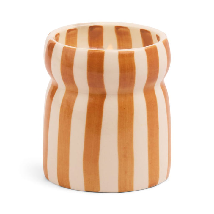 ceramic candle holder with orange and white striped pattern on a white background