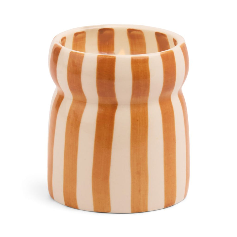 ceramic candle holder with orange and white striped pattern on a white background