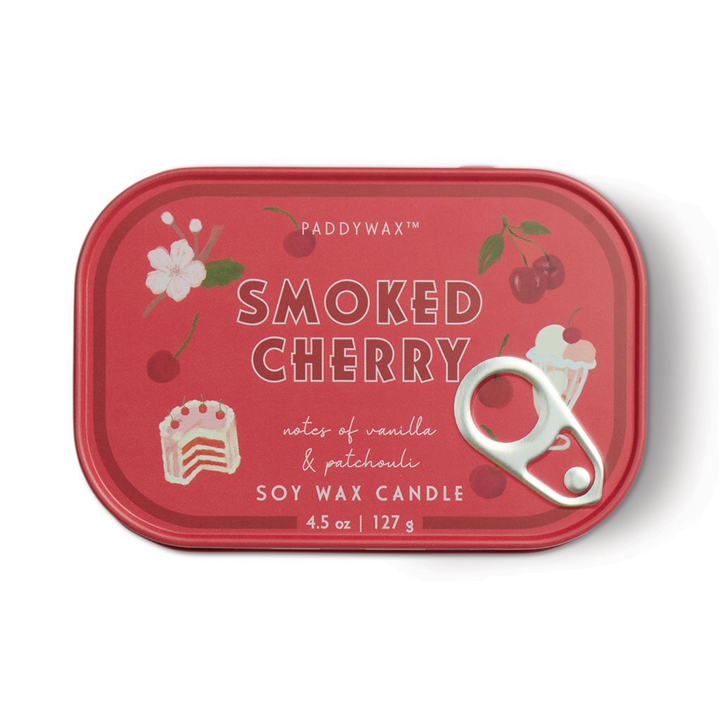 Red candle tin labeled 'Smoked Cherry' by Paddywax on a white background