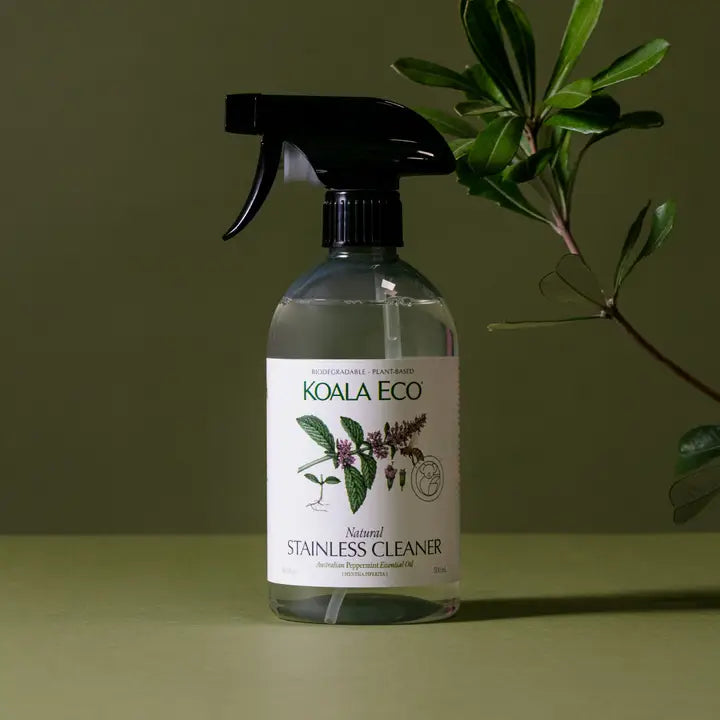 Koala Eco glass cleaner bottle on a green background