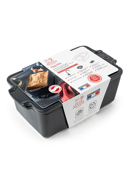 Grey terrine mould with a label on a white background
