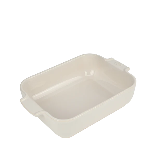 Rectangular beige ceramic baking dish on a white background