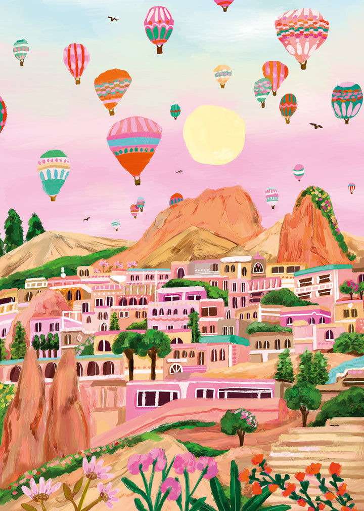 Illustration of a town with colorful hot air balloons in the sky