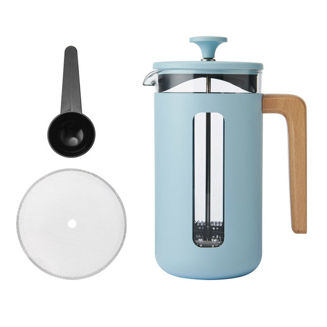 Light blue French press coffee maker with wooden handle and accessories on a white background