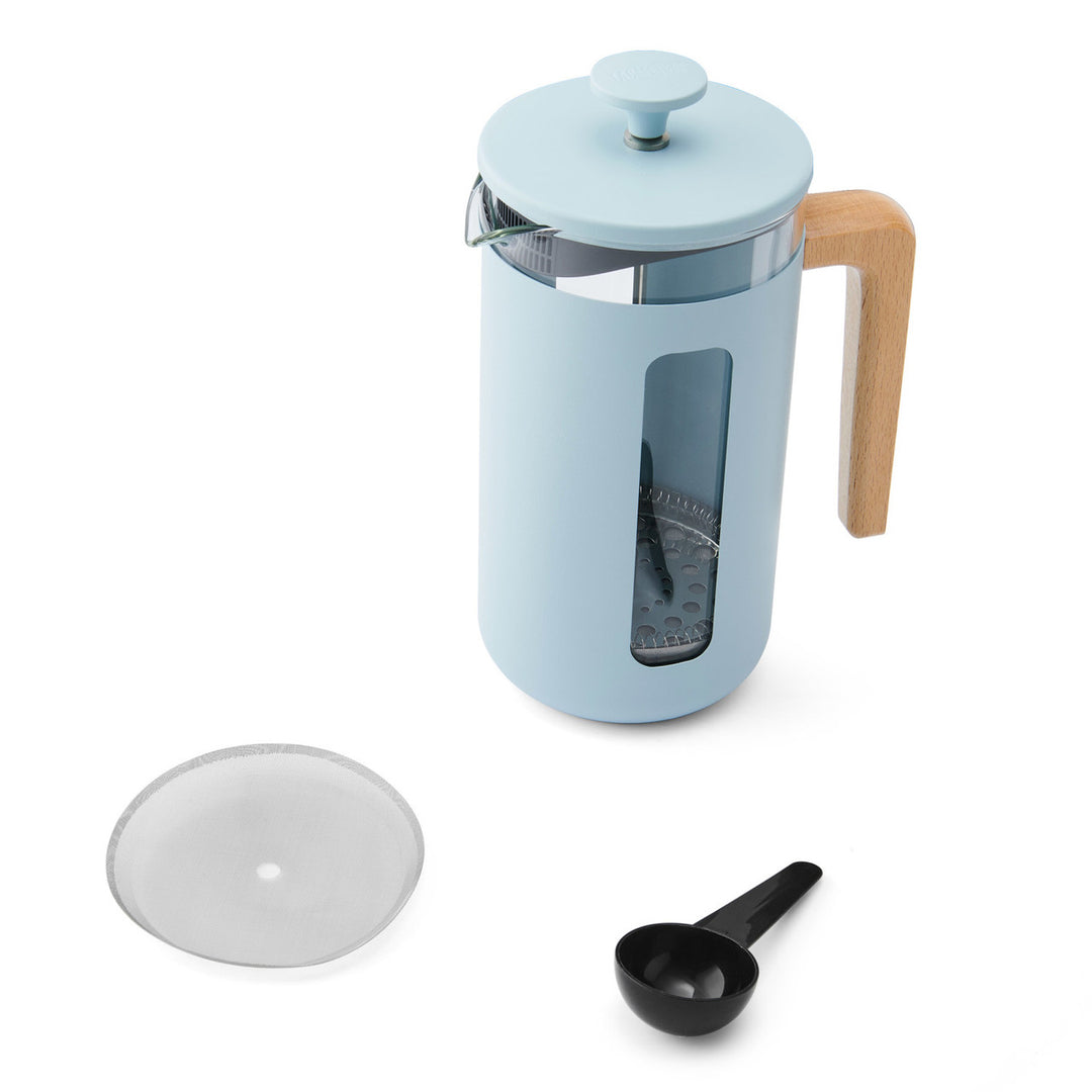Light blue French press coffee maker with wooden handle and accessories on a white background