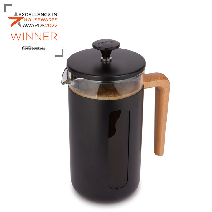 Black French press coffee maker with wooden handle on a white background, featuring 'Excellence in Housewares Awards 2022' text.
