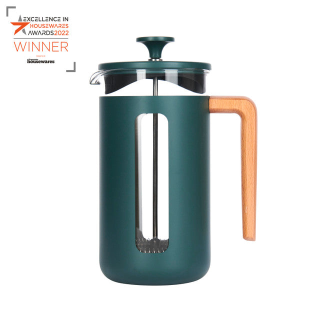 Green French press coffee maker with wooden handle on a white background, featuring an award badge.
