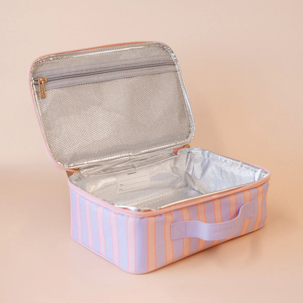 Insulated lunch box with pink and purple striped design on a beige background