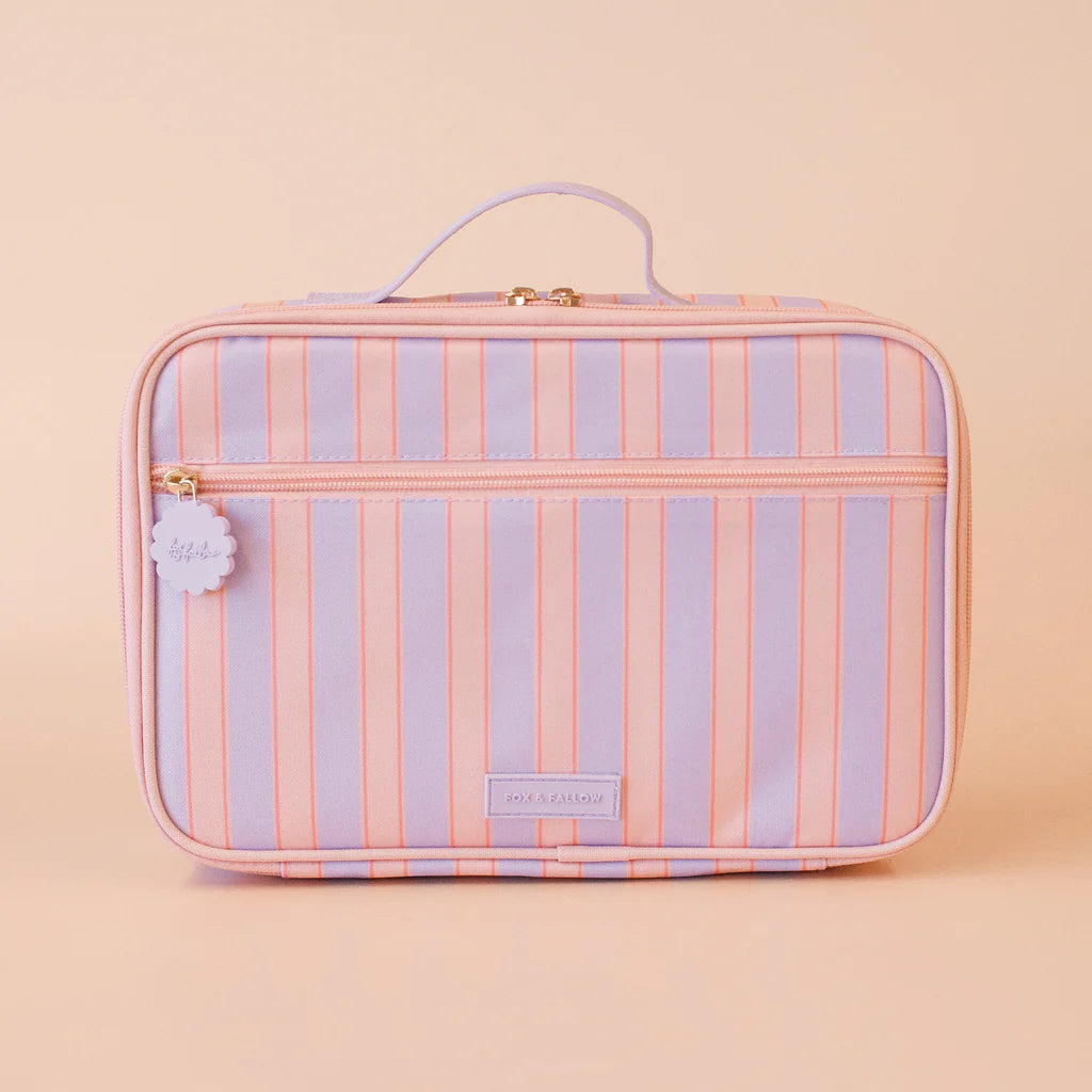 Pink and purple striped lunch bag on a beige background