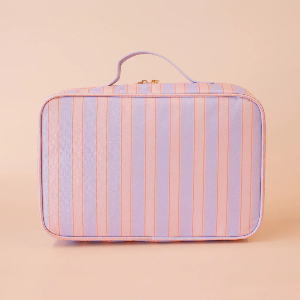 Striped lunch bag on a beige background