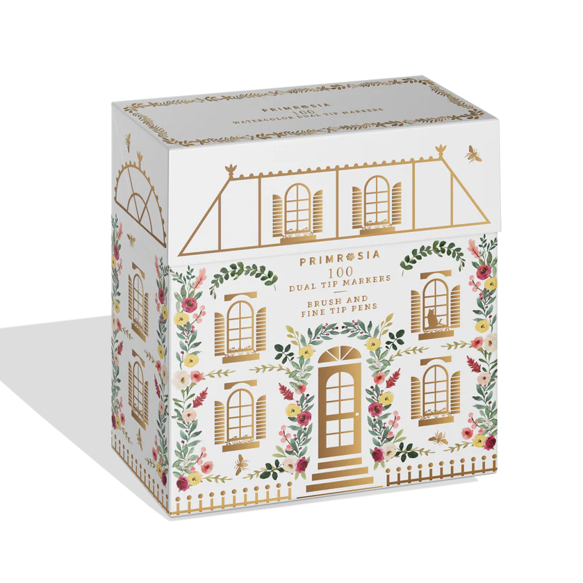 Decorative box of dual tip markers with architectural design and floral elements on a white background