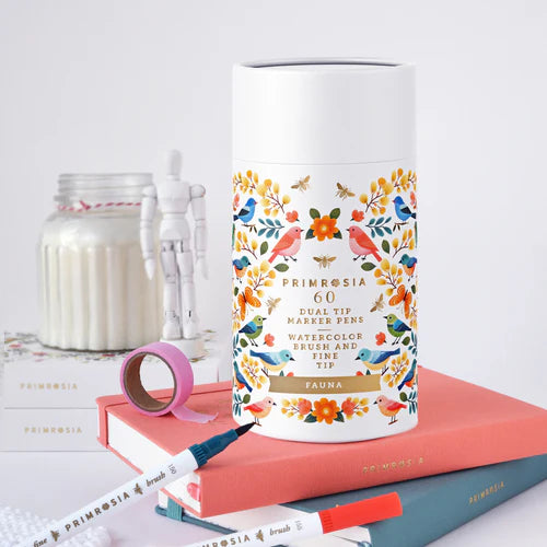 Decorative marker set with colorful packaging on books