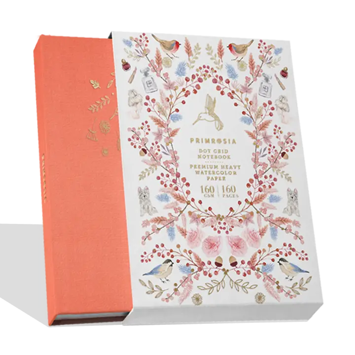 Notebook with floral design on the cover and packaging