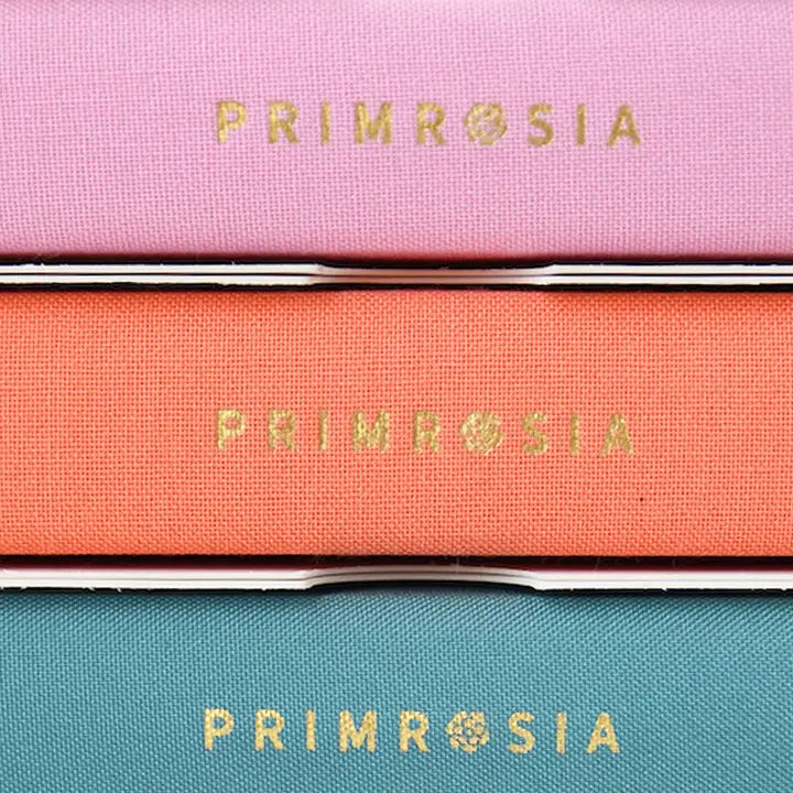 Three makeup products with &