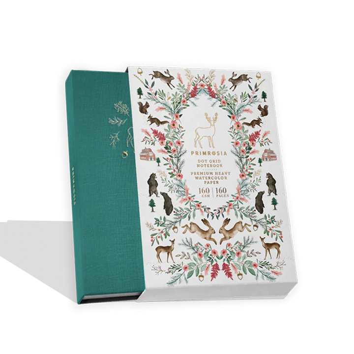 Book with a decorative cover featuring animal illustrations on a white background