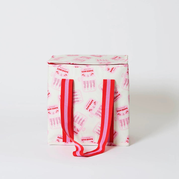 Tote bag with pink handles and a pattern on a white background