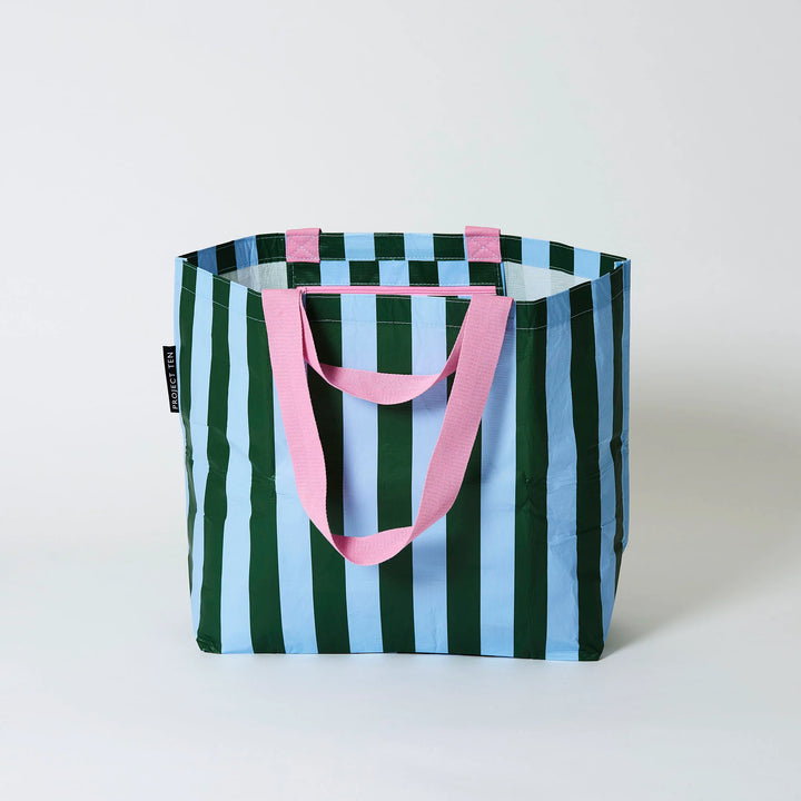 Striped tote bag with green, blue, and pink colors on a white background
