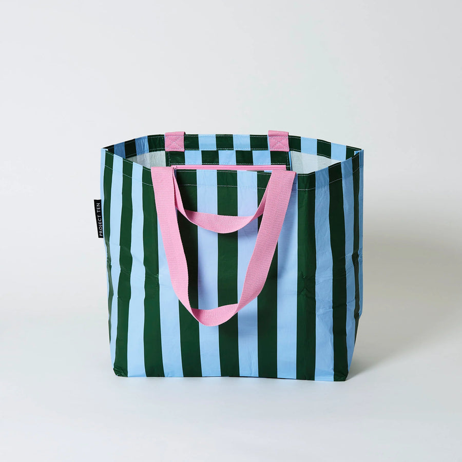Striped tote bag with green, blue, and pink colors on a white background