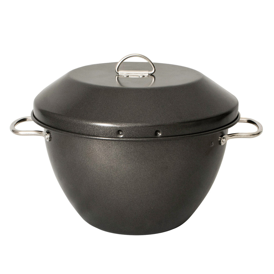 Black pot with a lid on a white background