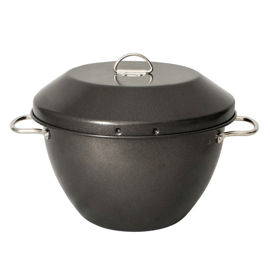 Black pot with a lid on a white background