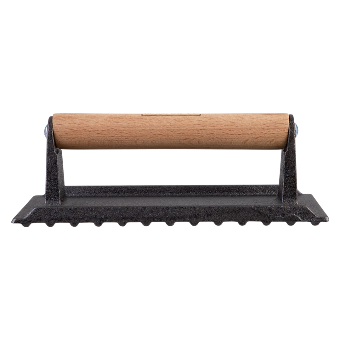 cast iron grill press on a white background