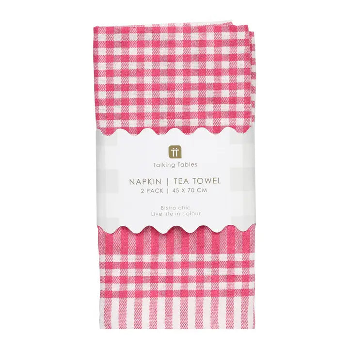 Pack of pink and white checkered tea towels with a white label on a white background