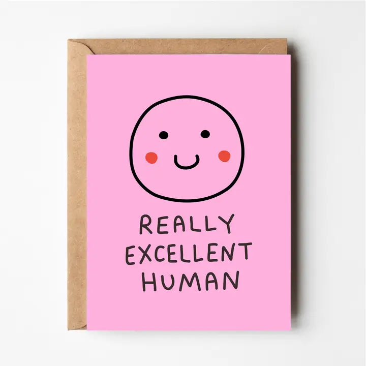 Card with a smiley face and 'Really Excellent Human' text on a pink background