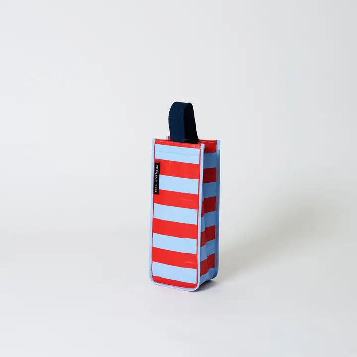 Red and blue striped bag with a handle on a white background