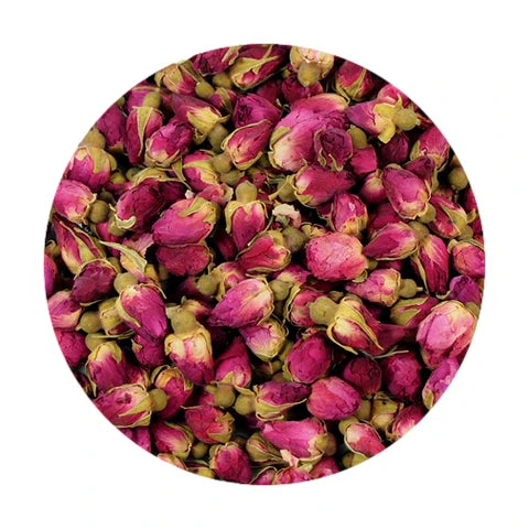 Close-up of pink and green rose buds in a circular arrangement on a white background