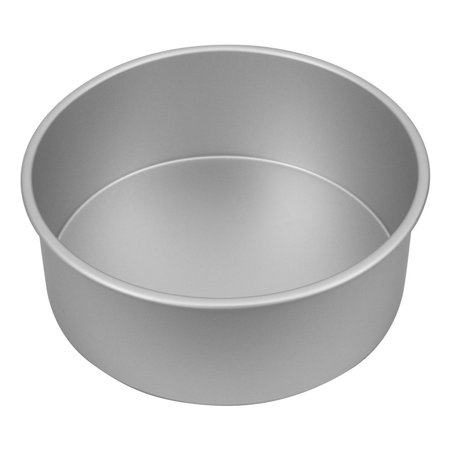 Metal cake pan on a white background