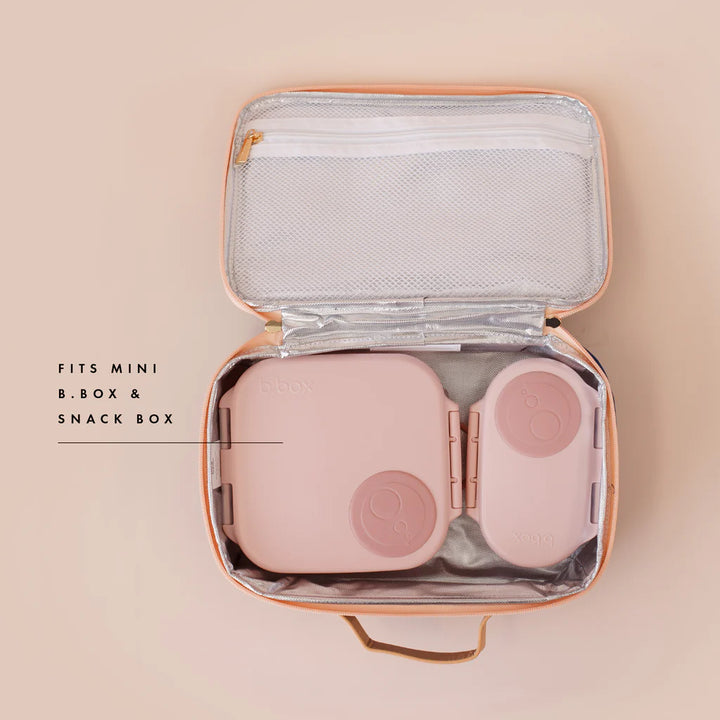 Pink snack box with a carrying case on a beige background