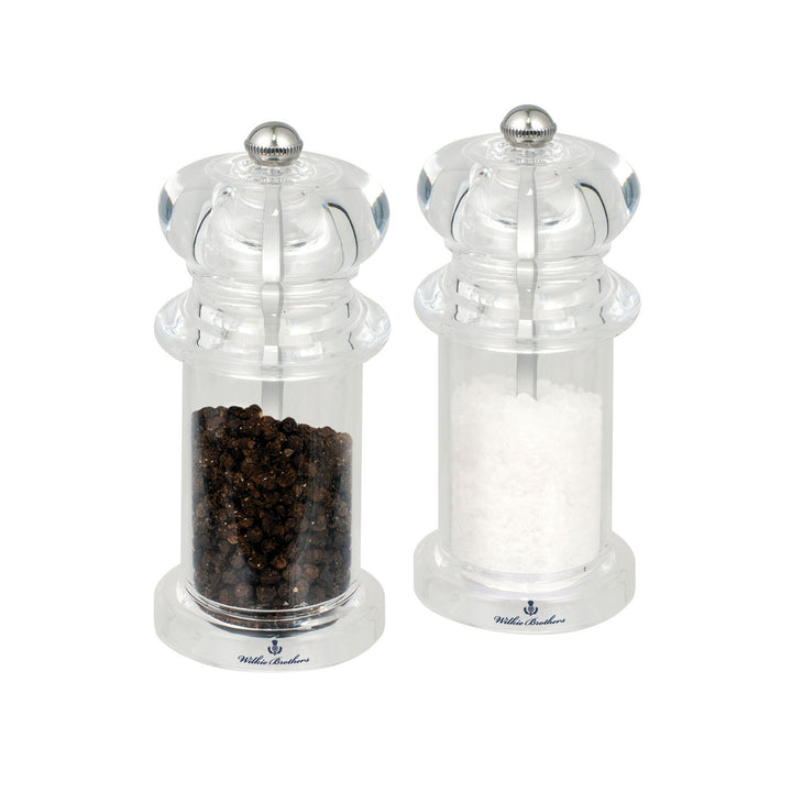 Clear salt and pepper mills on a white background