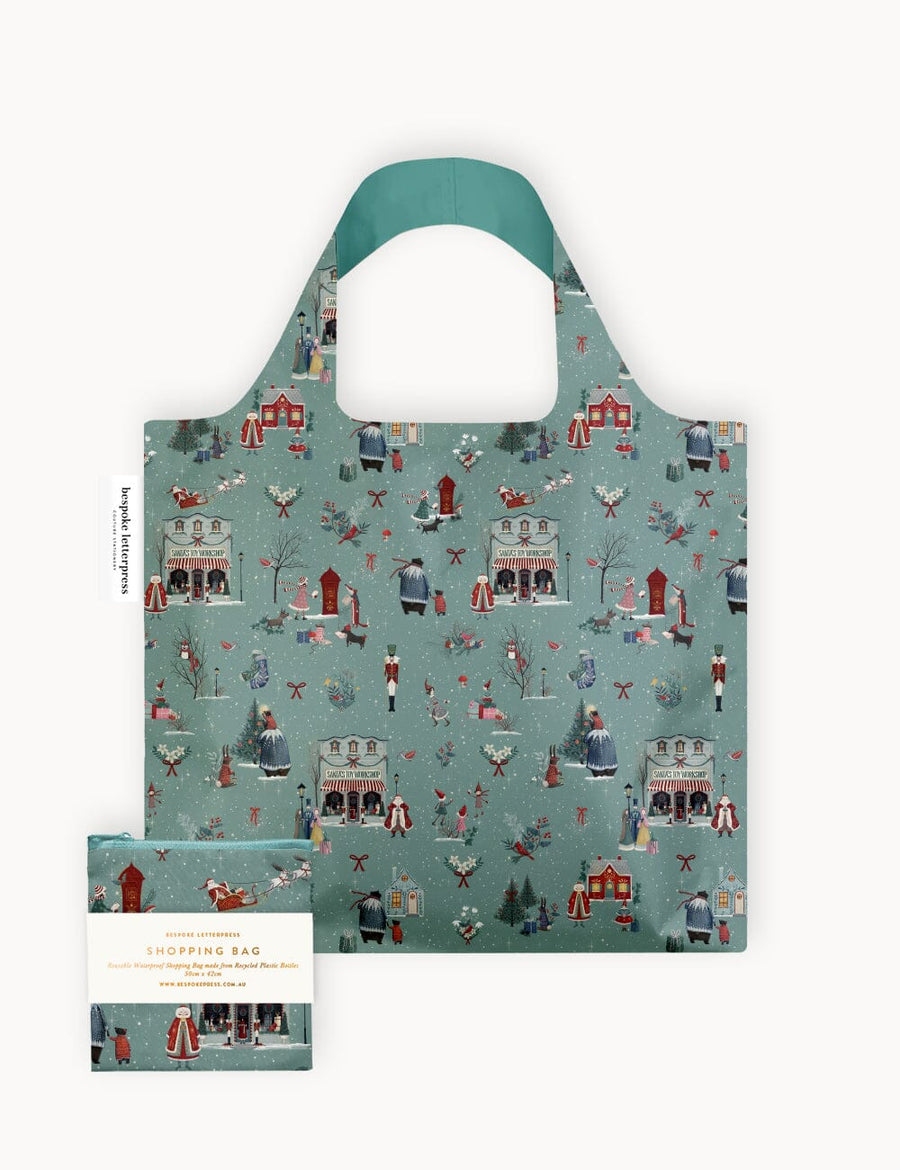 Reusable shopping bag with a pattern of people and buildings on a blue background