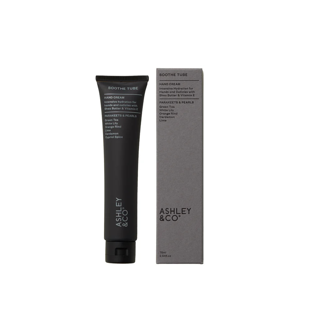 Black hand cream tube and gray box with &
