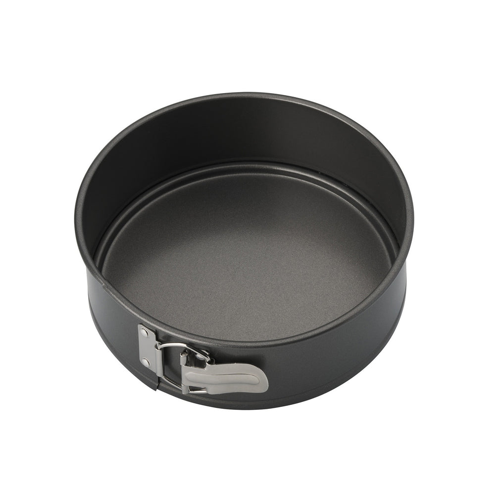 Black springform pan on a white background