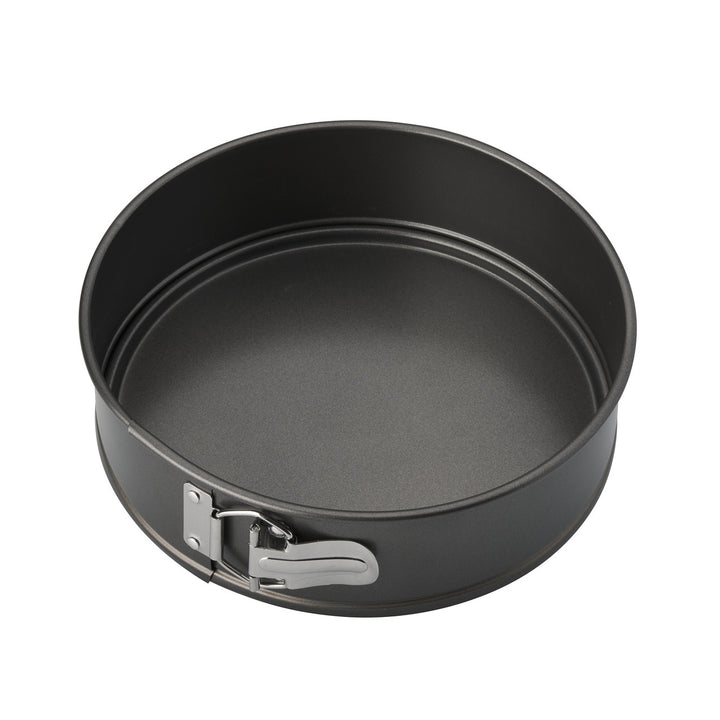 Black springform pan on a white background