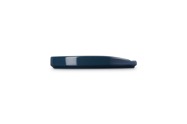 Navy blue spoon rest on a white background