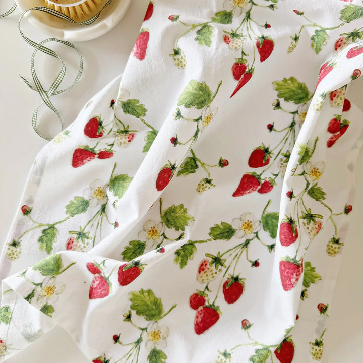 Fabric with strawberry pattern on a white background