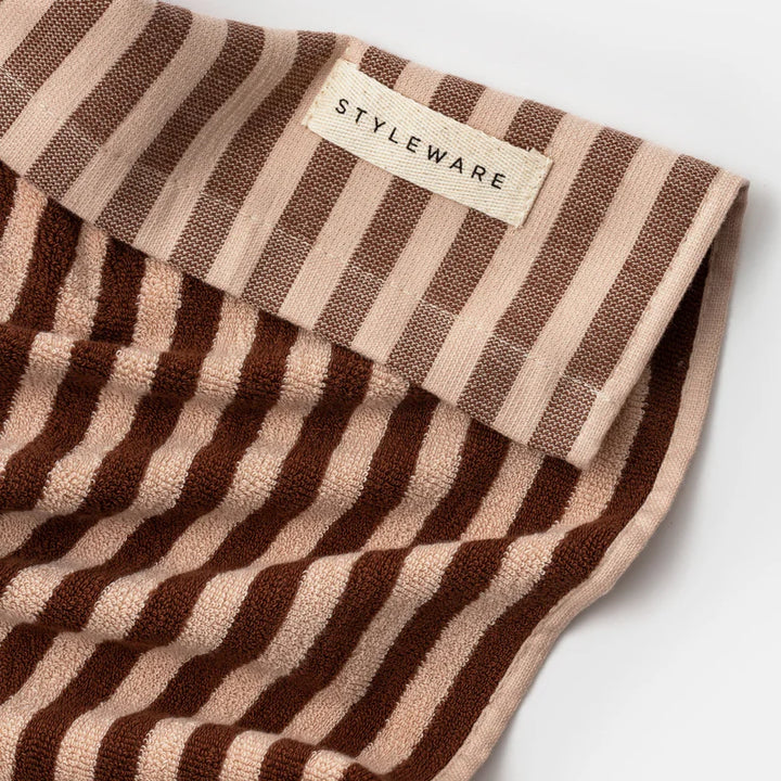 Brown and beige striped sock with 'STYLEWARE' label on a white background
