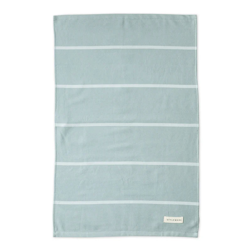 Light green tea towel with white stripes on a white background