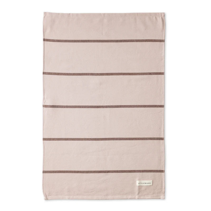 Beige towel with brown stripes on a white background