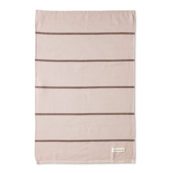 Beige towel with brown stripes on a white background