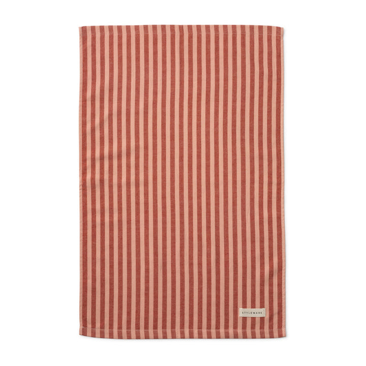 Red and beige striped tea towel with a brand label on a white background