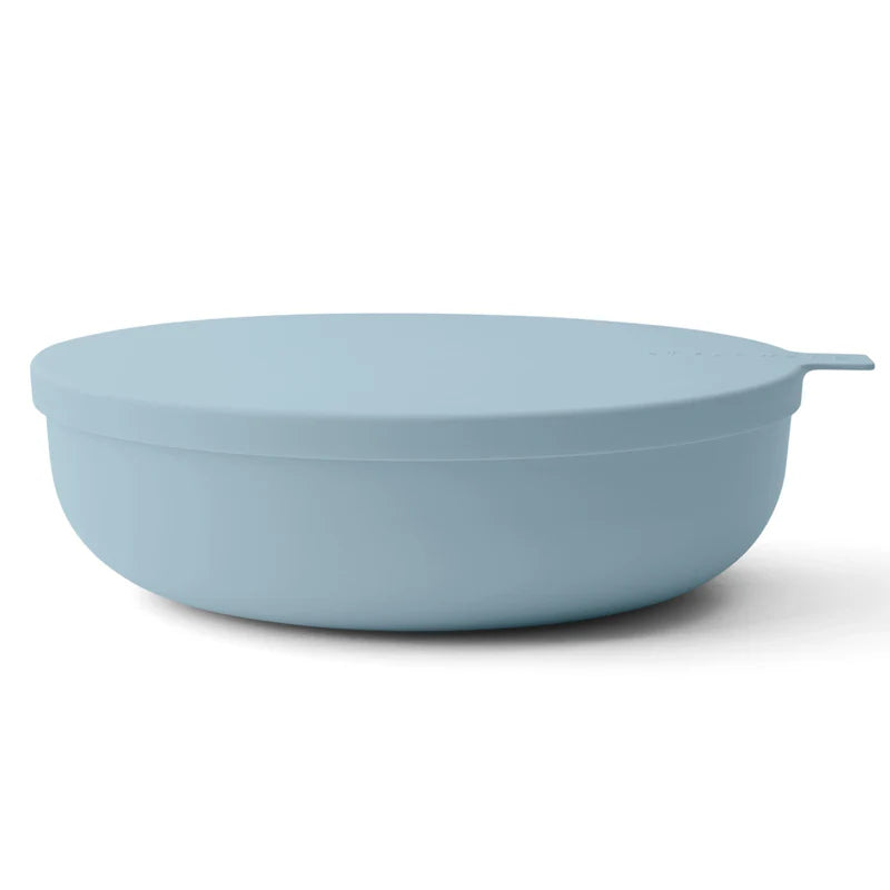 Light blue bowl with lid on a white background