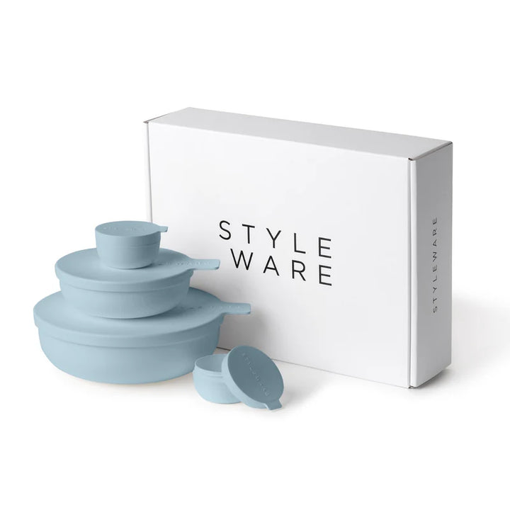 Set of light blue plastic bowls with a 'STYLE WARE' box on a white background