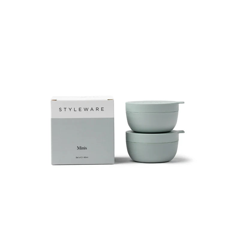 Two light green bowls with a 'STYLEWARE' box on a white background