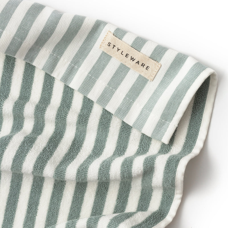 Striped towel with 'Styleware' label on a white background