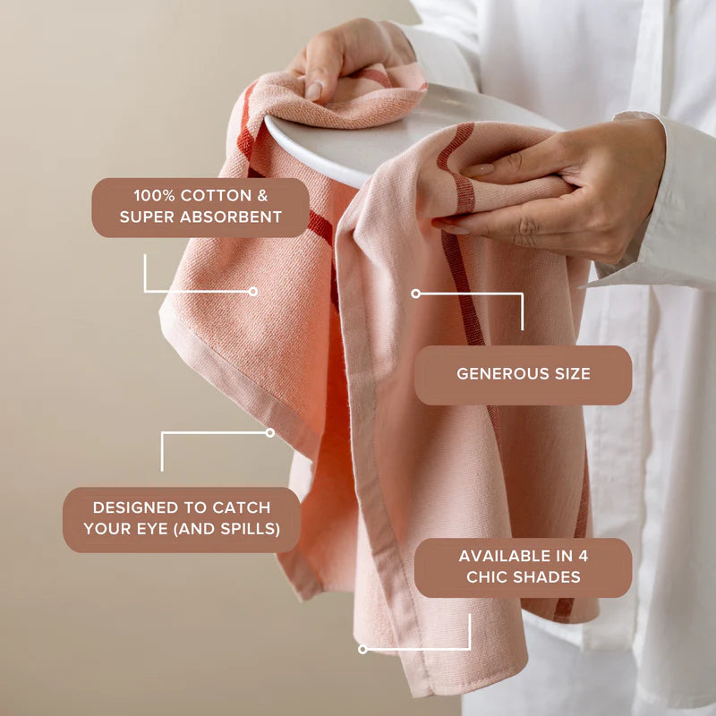 Person holding a pink towel with text highlighting features on a beige background